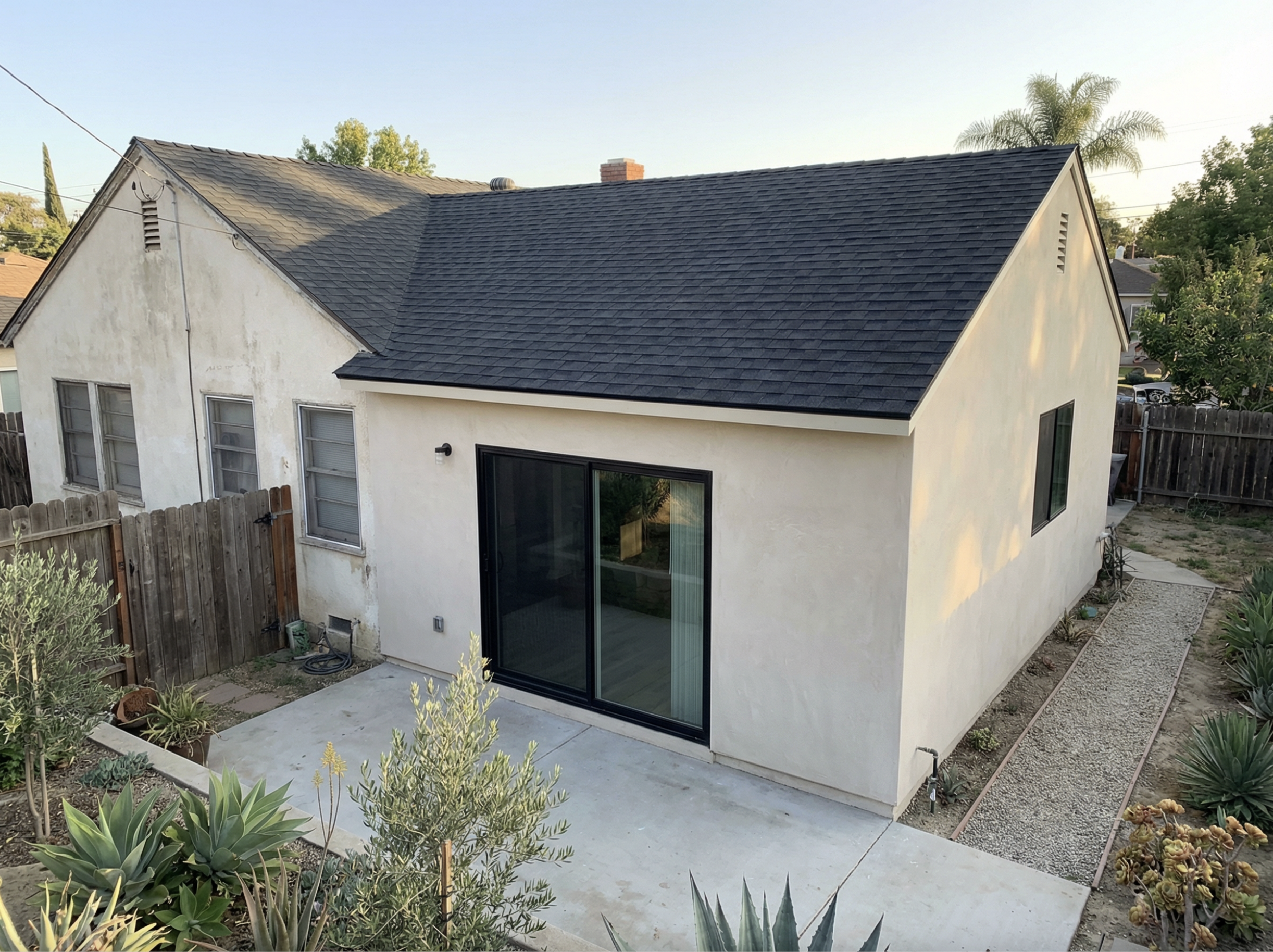 Whole-house renovation and addition with new stucco and rooflines in Los Angeles — YBL Design & Build